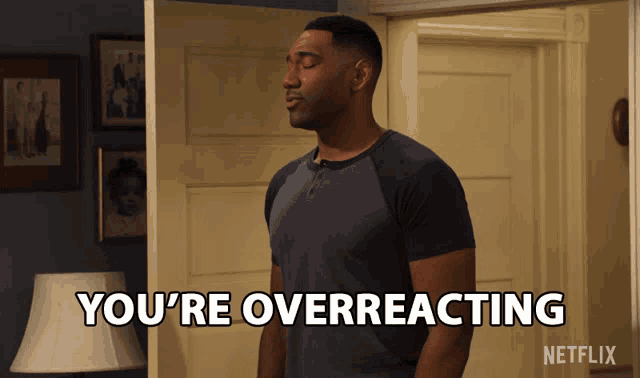 a man says you 're overreacting in front of a lamp
