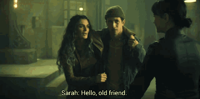 a woman holding another woman 's hand with the words izadora hello sarah above her