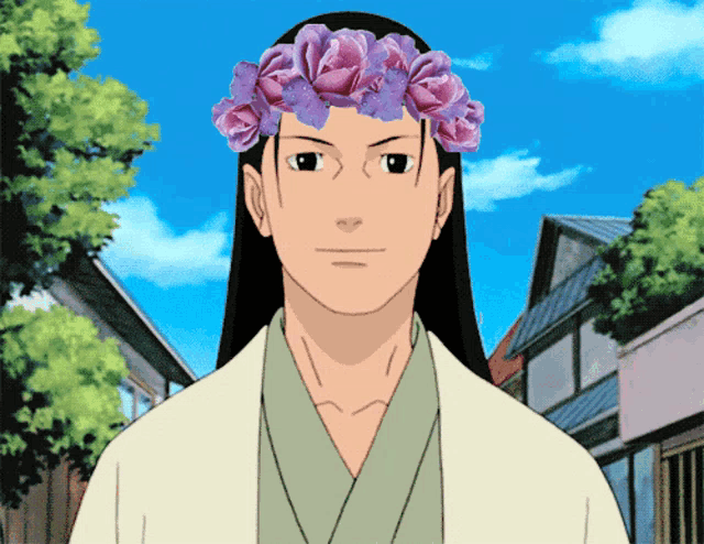 a man wearing a flower crown on his head