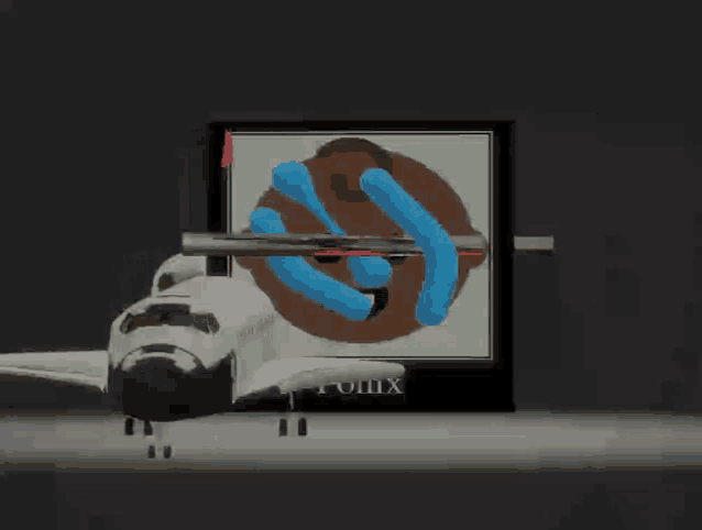 a drawing of a space shuttle next to a sign that says ' phoenix ' on it
