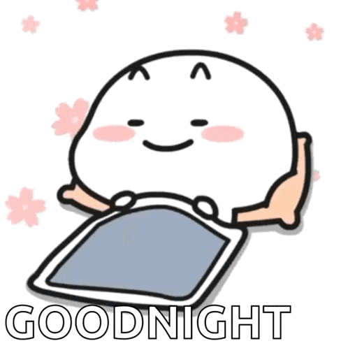 a cartoon character is laying on a bed with the words goodnight written on it .