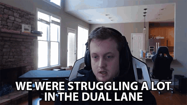 a man wearing headphones says we were struggling in the dual lane