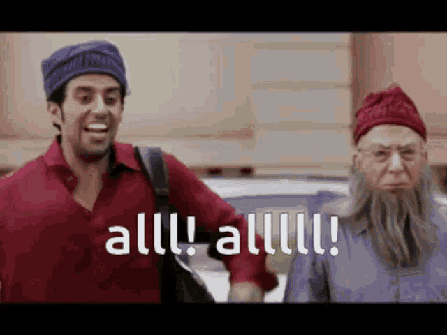 two men are standing next to each other and one of them is saying all !