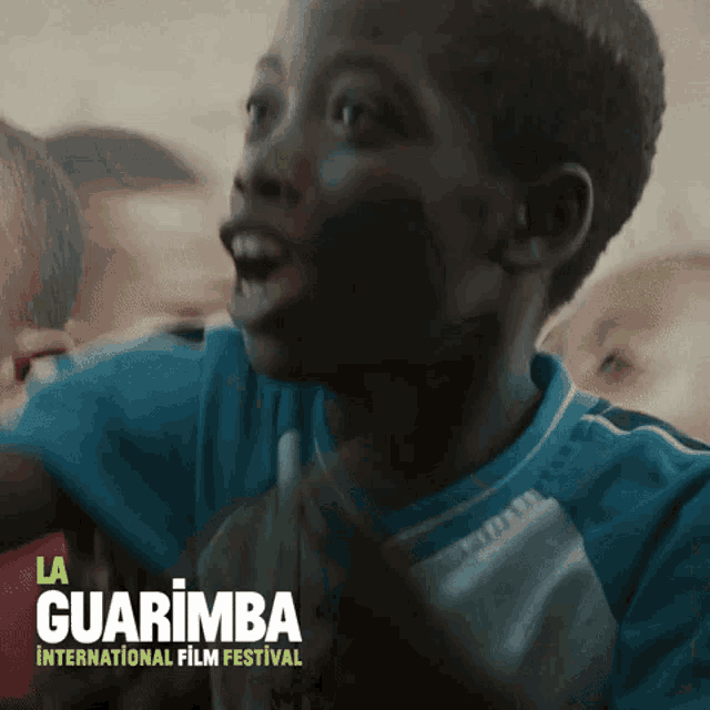 a poster for la guarimba international film festival shows a young boy