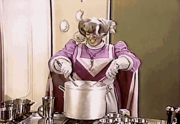 a woman in a purple dress is stirring a pot of food