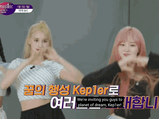 a girl with pink hair is dancing in front of a sign that says kepler
