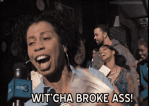 a woman is holding a bunch of money in her hand and laughing while talking into a microphone .