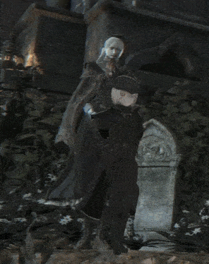 a man and a woman standing next to each other