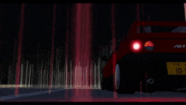 a red car with az-1 written on the back of it