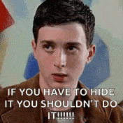 a young man is making a funny face while talking to someone .