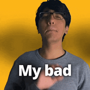 a man wearing glasses and a grey shirt says " my bad "