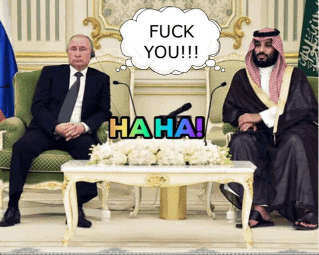 two men sitting at a table with a speech bubble that says fuck you