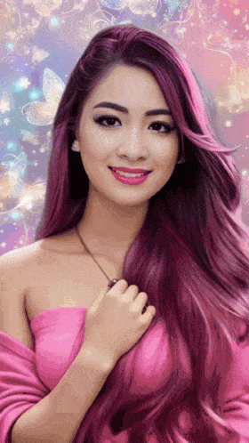 a woman with purple hair is wearing a pink shirt