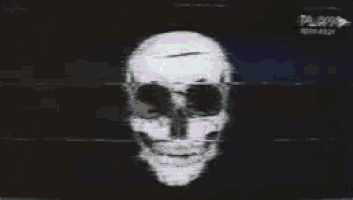 a skull is displayed on a black background with the words play in the upper right corner