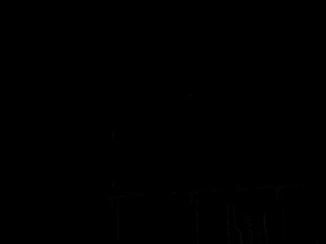 a large billboard with a picture of a girl on it in front of a city skyline