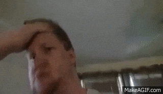 a man with a beard is making a funny face on make a gif