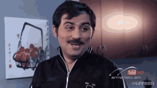 a man with a mustache is in front of a sign that says youtube hd