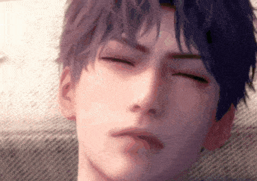 a close up of a young man 's face with his eyes closed