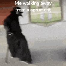 a person is walking away from a argument with a caption that says " me walking away from a agrument "