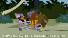 a cartoon of a duck sitting in a chair with the words " now this i what i call multitasking "