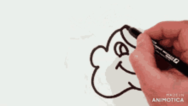 a person is drawing a heart with a marker and the words made in animatica are visible