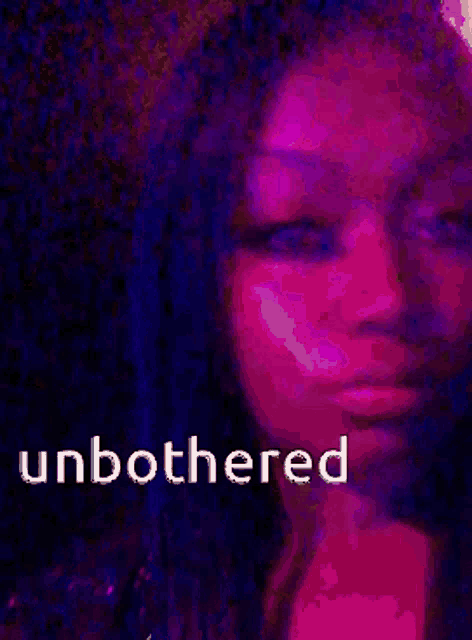 a woman 's face is shown with the words " unbothered " on the bottom