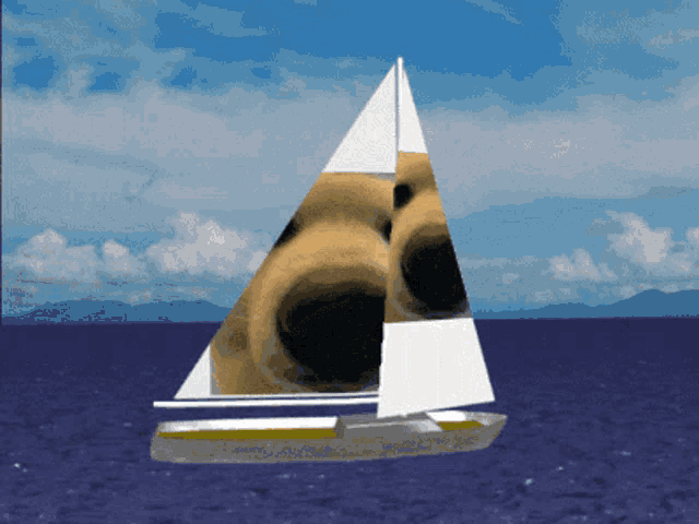 a boat with a picture of a dog on the sails
