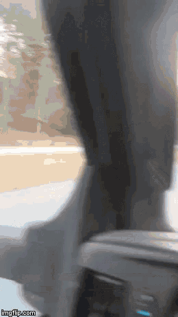 a blurry picture of the inside of a car with imgflip.com written below it
