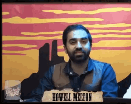 a man with a beard and a sign that says howell melton