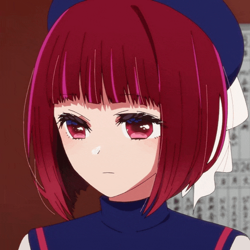 a girl with red hair and a blue hat