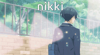a man in a suit is walking in front of a fence and the word nikki is on the screen