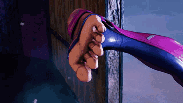 a person in a purple and pink suit is holding a wooden door handle