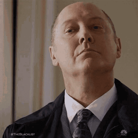 a close up of a man 's face with #theblacklist on the bottom