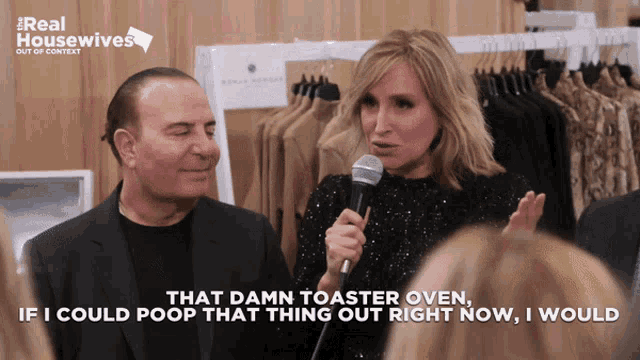 a woman speaking into a microphone with the words " that damn toaster oven "