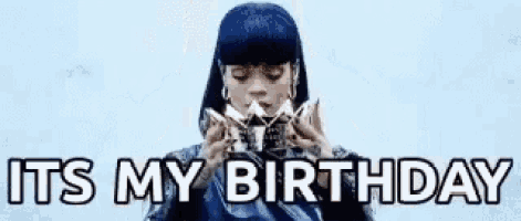a woman is wearing a crown on her head and saying it 's my birthday .