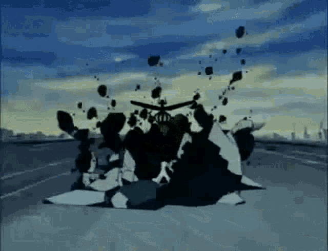 a group of people are standing on top of each other on a road .