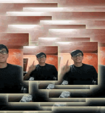 a man wearing glasses giving the middle finger