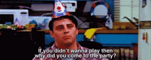 a man wearing a birthday hat says if you did n't wanna play then why did you come to the party ?