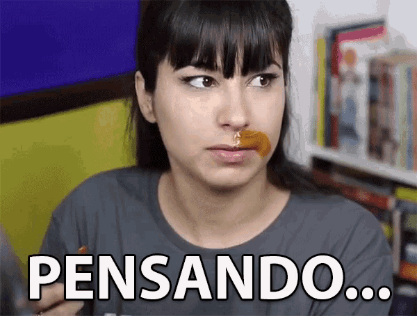a woman with a piece of honey on her face says pensando