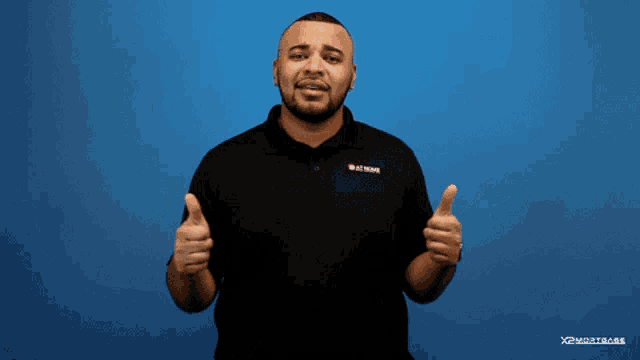 a man giving a thumbs up in front of a blue background that says " thank "