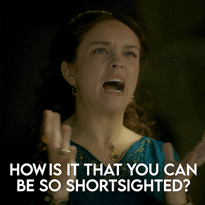a woman in a blue dress is screaming with the words how is it that you can be so shortsighted