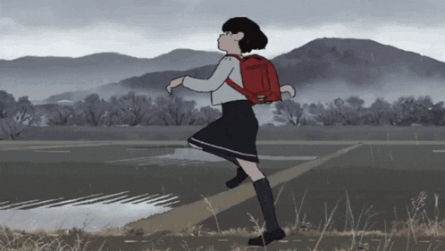 a girl with a red backpack is running down the road