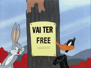 bugs bunny and daffy duck stand next to a sign that says vai ter free