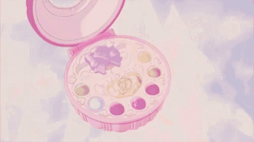 a pink purse with a purple flower on it is flying in the air .