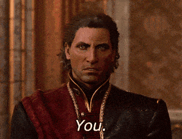 a man in a red and black costume says " you "