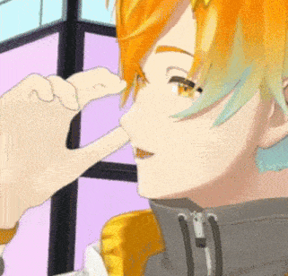 a close up of a person touching another person 's nose with their finger