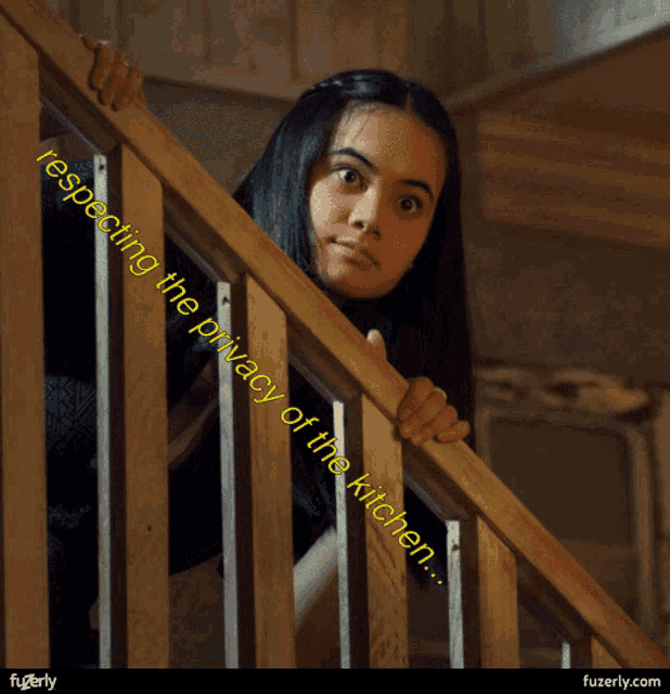 a woman is standing on a set of stairs with the words respecting the privacy of the kitchen