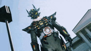 a man in a costume with a belt that says ' a ' on it