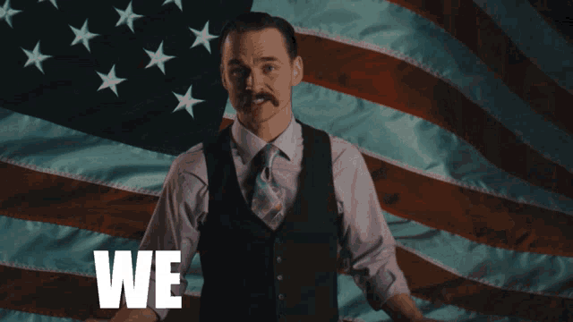 a man in front of an american flag with the words we need you on it