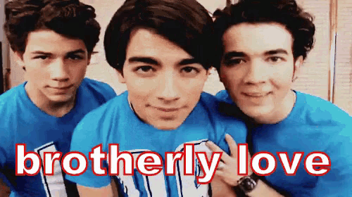 three boys in blue shirts are posing for a picture and the caption says " brotherly love "